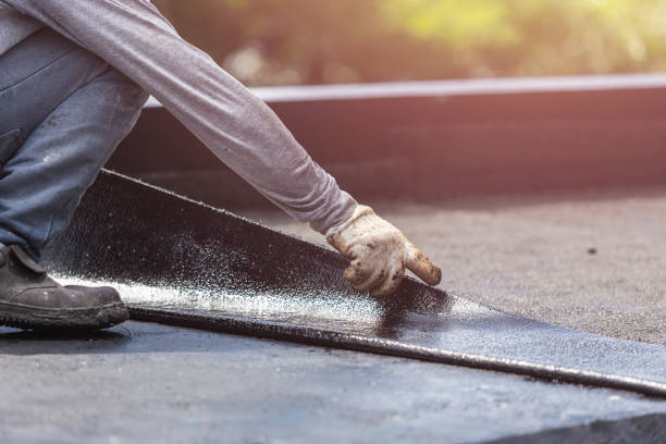 Professional Waterproofing technician working in Holley, NY